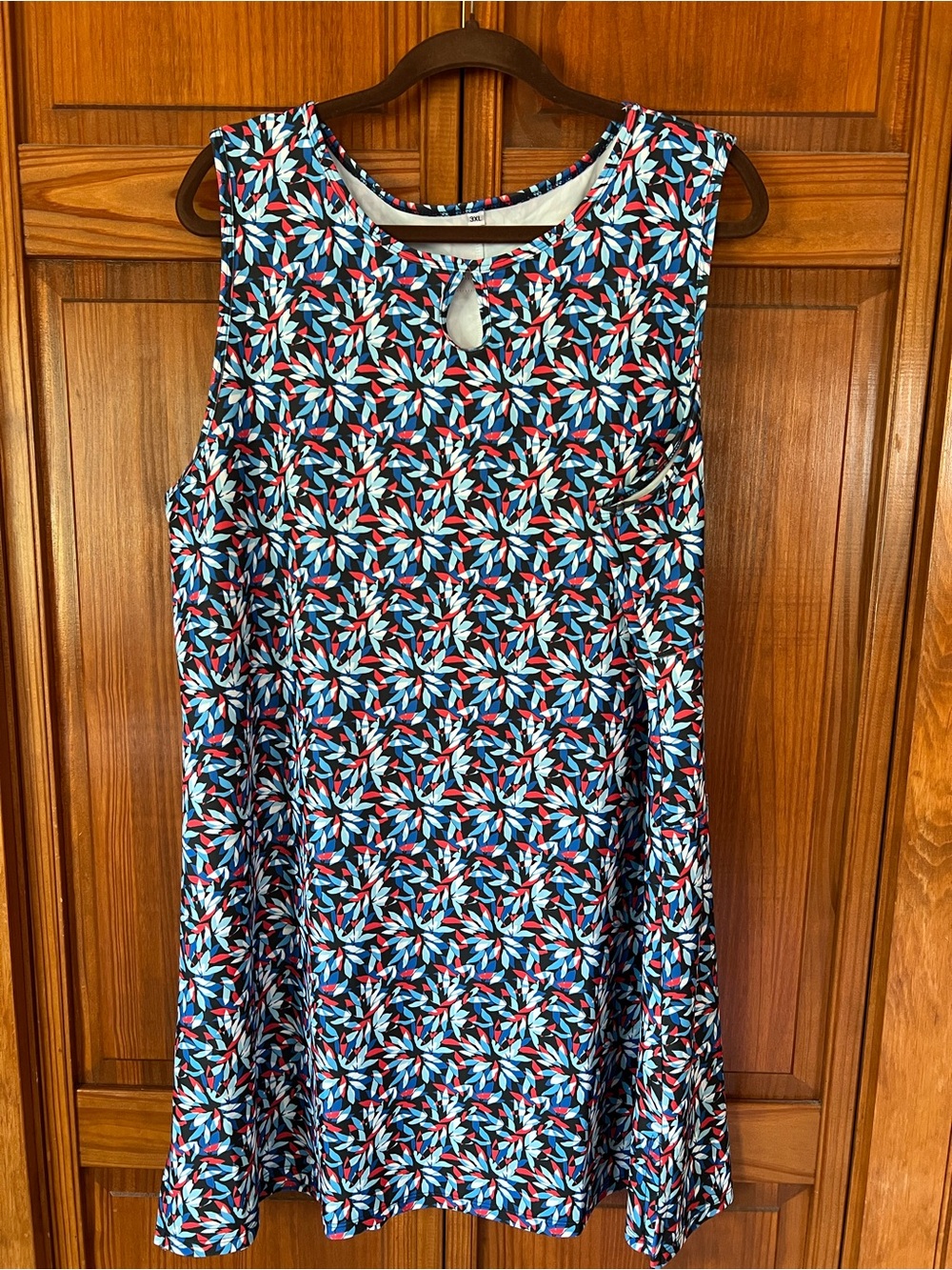 Sleeveless Mini A-Line Dress in Navy, Blue & Red Leaf Print